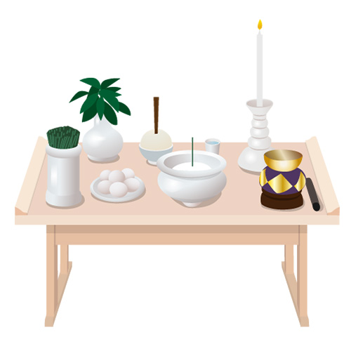 家族葬のアートの仏壇に並んだ線香や供物が置かれた枕飾り